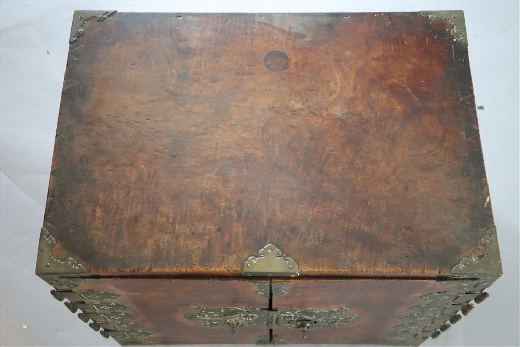 An Indo-Dutch satinwood and brass mounted cabinet, Batavia 1650-1680, Width 2ft 4in, depth 1ft 7in, height 2ft.